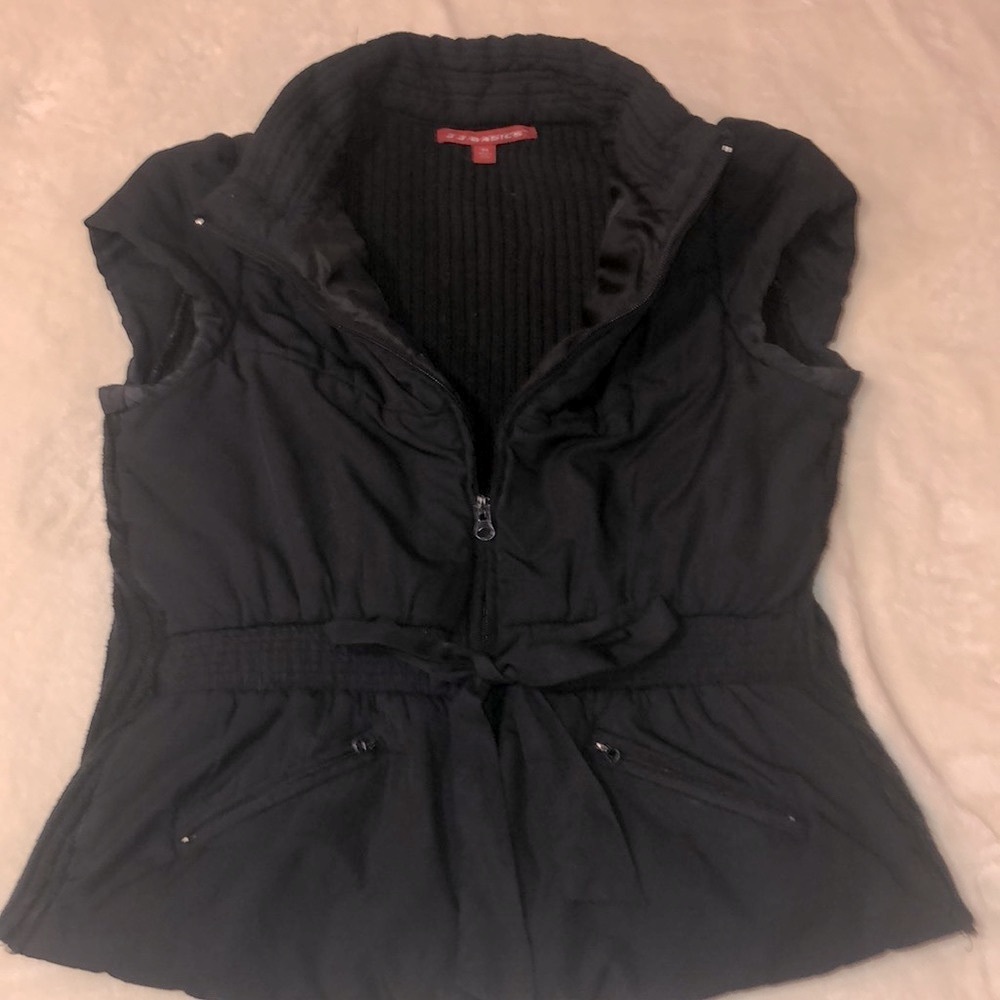 Women’s black zip up vest with front tie